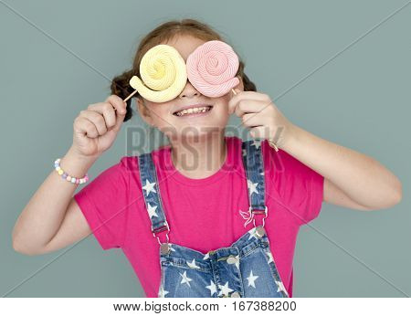 Little Girl Smiling Happiness Studio Portrait Sweet Lollipop