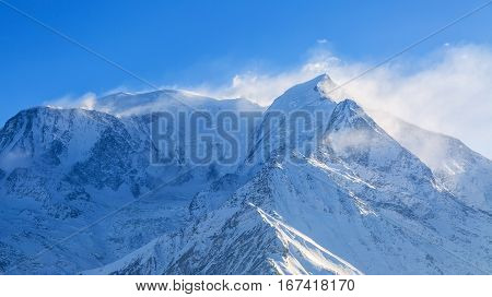 Blizzard on the highest European mountain peak Mont Blanc.
