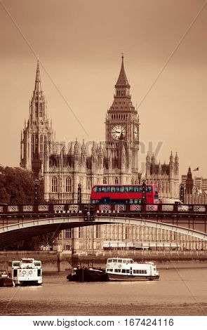 Big Ben, House of Parliament and Lambeth Bridge with red bus in London.