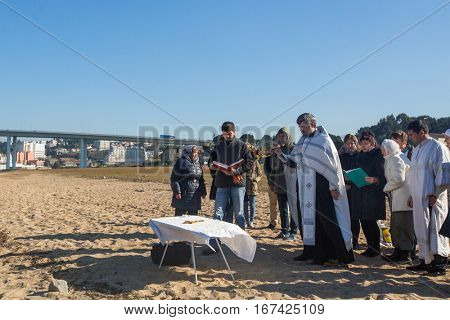 PORTO, PORTUGAL - JAN 19, 2017: Celebrating Baptism of Jesus in the Parish of Russian Orthodox Church near Douro river. This is one of the holiest holidays for all Christians. 