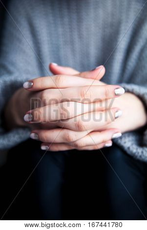 Stylish gray manicure with overflowing Fashion hands fingers