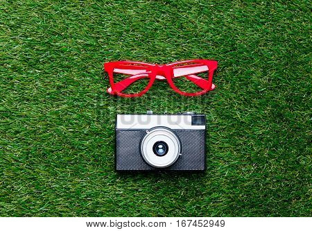 Vintage Camera And Red Styled Glasses