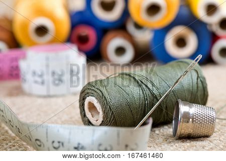 sewing kit with tape measure in the workroom