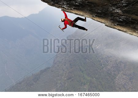 Extreme climbing is his adrenaline . Mixed media