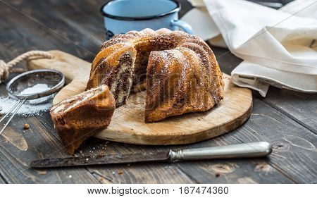 Cake. Marble cake cup of coffee powder sugar kitchen vintage utensil and fresh fruit berries.