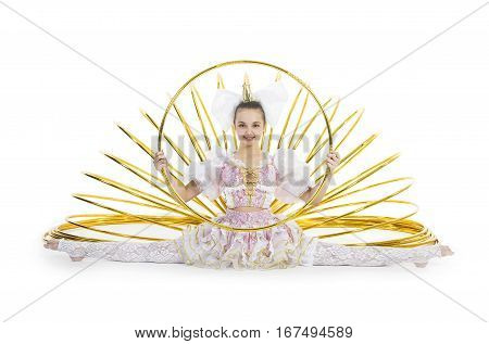 A gymnast sitting in side splits with a hula hoop on white background. Studio photography of circus performers.