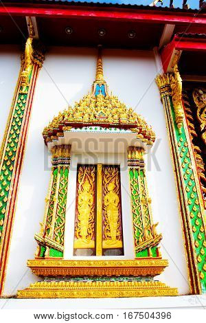 Beautiful Wat Thai golden temple architecture detail Photharam Ratchaburi Thailand