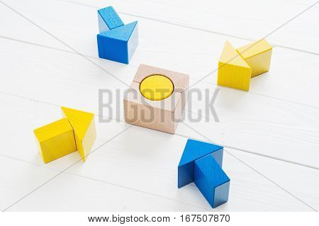Symbol of goal and objective. Four wooden arrows converge towards the center target. Arrows pointing to the object. Business concept. The concept of the goal the implementation of the planned success