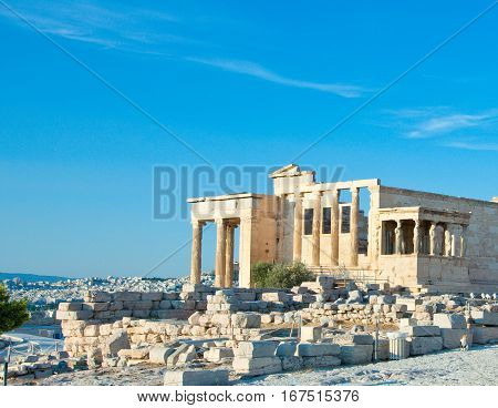 The Erechtheion With Panorama Of Athens On The Top Of Acropolis. Greece.