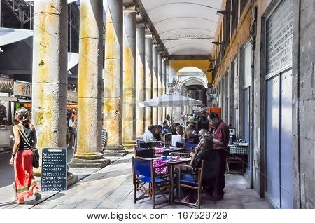 Barcelona-july 22: Boqueria Market On The Ramblas People Enjoy Their Meal In A Local Restaurant On J