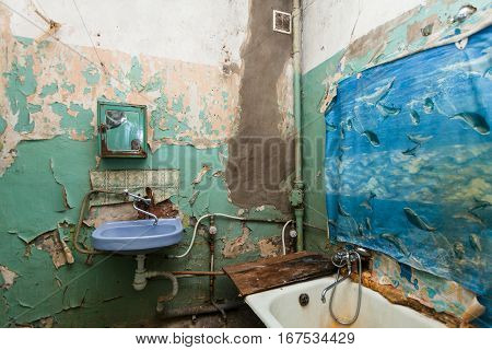 Dirty bathroom is in the temporary apartment for living (existence) refugees