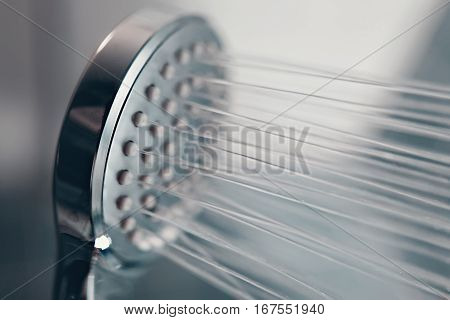 Shower Head With Flow Of Water Spilling Out Closeup.