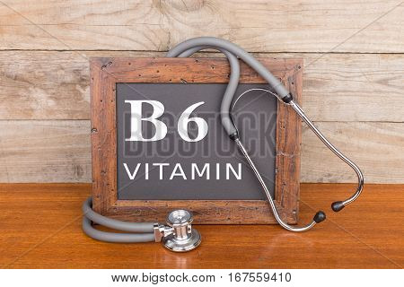 Stethoscope And Blackboard With Text 