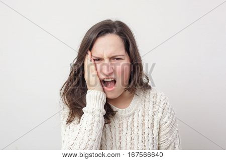 Girl Shocked Grabs Her Face. Twinge Of Toothache
