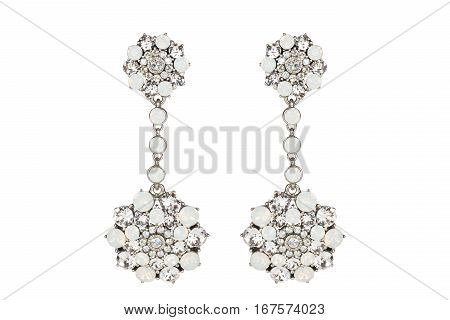 Jewelry on a white background. Women's earrings premium with precious stones. Isolate Jewelry. Briliant