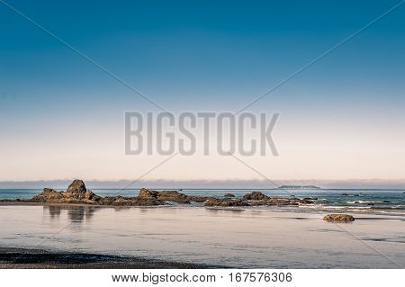 rocks and waves at Pacific Ocean in Ruby Beach of Olympic National Park Washington State USA