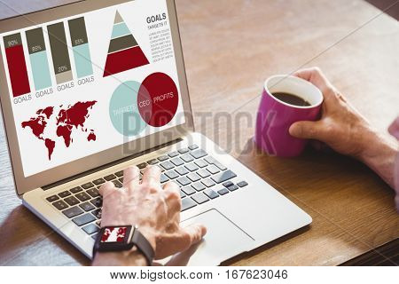 Vector image of business presentation with charts and map against cropped image of man using laptop