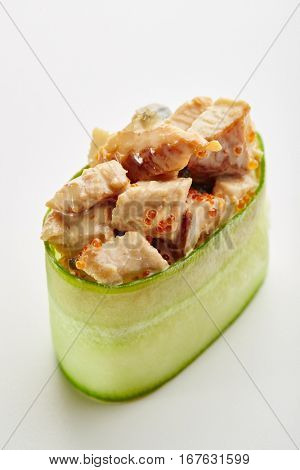 Japanese Sushi - Unagi Gunkan Sushi (Cucumber wrapped Smoked Eel Sushi) on White Background. Cucumber Slice outside