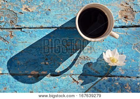 Coffee Mug With Flowers On Rustic Table
