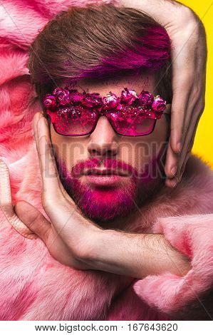 Man In A Pink Fur Coat And Carnival Glasses