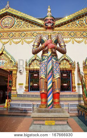 Statue Standing Outside Wat Chayamangkalaram Located In Penang