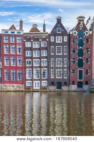 Colorful Houses At The Damrak In Amsterdam