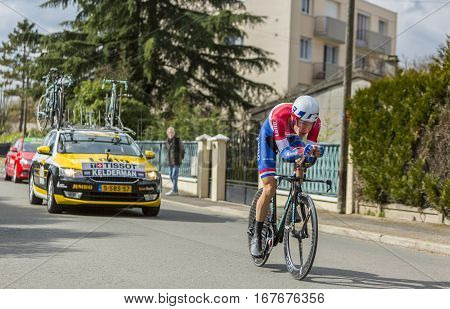 Conflans-Sainte-HonorineFrance-March 62016: The Dutch cyclist Wilco Kelderman of Lotto NL-Jumbo Team riding during the prologue stage of Paris-Nice 2016.