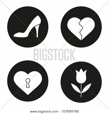 Valentine's Day icons set. Woman's shoe, tulip, heartbreak, heart with keyhole. Vector white silhouettes illustrations in black circles