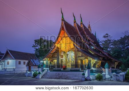 Wat Xieng thong temple at twilight time in Luang Pra bang Laos.