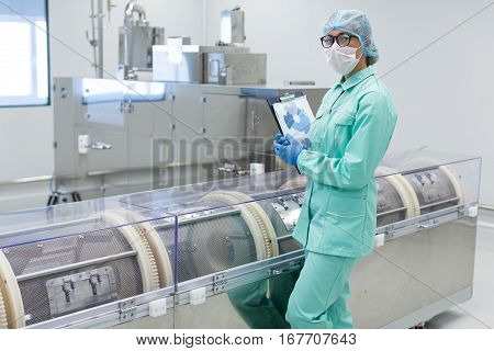 Scientist Standing Near Centrifuge