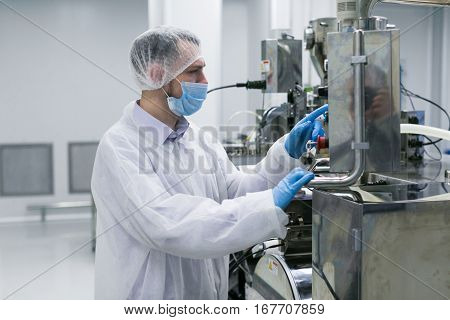 Plant Picture, Scientist Configures Control Panel
