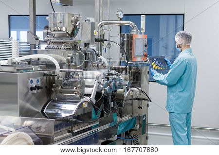 Plant Picture, Scientist Configures Control Panel