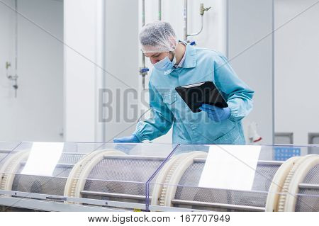 Factory Worker Is Checking Serviceability Of Machine