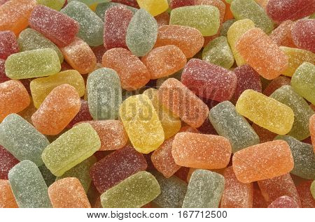 Pile of  gummy fruits Of different colors