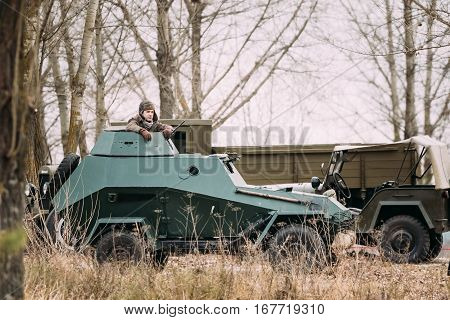 Gomel, Belarus - November 26, 2016: BA-64 Is A Small Lightly Armoured Soviet Scout Car Stands In Autumn Forest.
