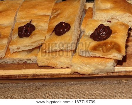 Slices Of Italian Bread With Chocolate Sauce, Sweet And Savoury Italian Snack
