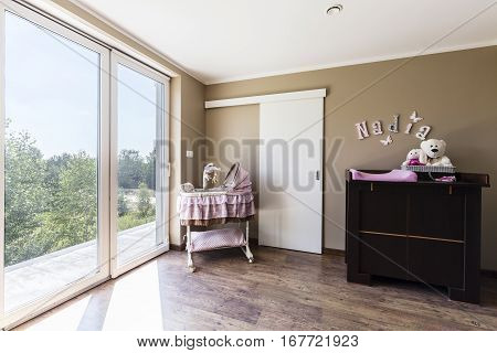 Nursery With Pink Pushchair For Child