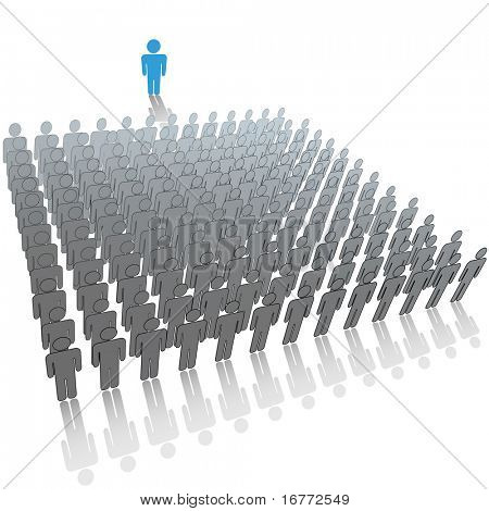Communication leader or speaker talks in front of a large audience group of people.