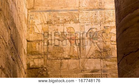 Egyptian ancient temple engravings on the wall