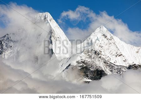 Malangphulang Beautiful panoramic view of himalayas with clouds near mount Ama Dablam on the way to Everest base camp Nepal
