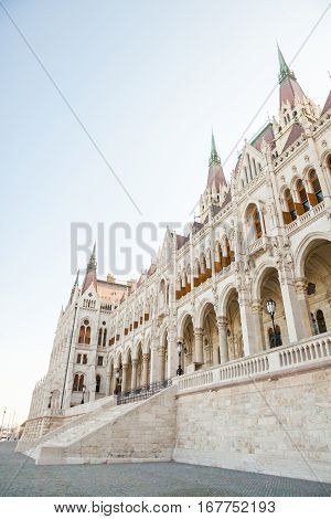 Building Of Hungarian Parliament Viewed From The Side Of The Dunabe River In Budapest, Hungary