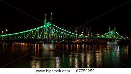 Liberty Bridge Connecting Buda And Pest Across Dunabe River In Budapest, Hungary