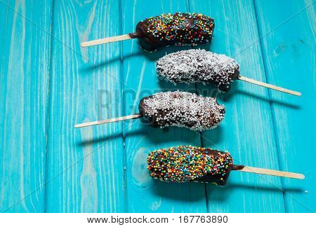 Chocobanana - traditional dessert in Guatemala of frozen banana dipped into hot chocolate.