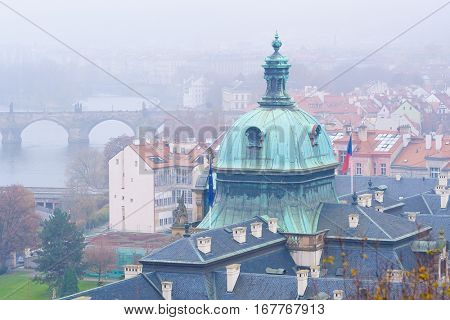 Panorama of an old Prague, bridges and embankment of Vitava river, Czechia