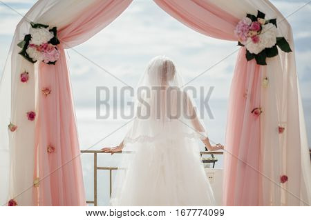 Bride In Wedding Arch Destination