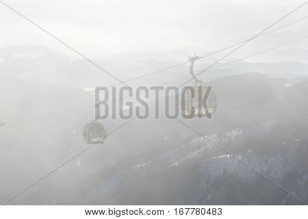 JASNA SLOVAKIA - JANUARY 23: The cabins of cableway on Chopok station in Jasna Low Tatras. It is the largest ski resort in Slovakia with 49 km of pistes on January 23 2017 in Jasna Slovakia