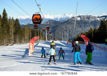 JASNA SLOVAKIA - JANUARY 20: The snowpark skiers and cableway in Jasna Low Tatras. It is the largest ski resort in Slovakia with 49 km of pistes on January 20 2017 in Jasna Slovakia