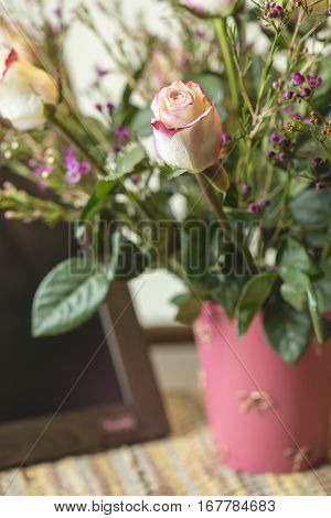 Bouquet of white and pink Roses and Waxflower for a holiday gift