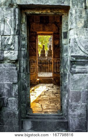 From door to door, side entrance to part of the Sewu Temple at Prambanan site, Yogyakarta, Java, Indonesia