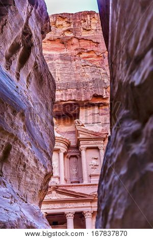 Outer Siq Rose Red Pink Treasury Afternoon Petra Jordan Petra Jordan. Treasury built by the Nabataens in 100 BC. Yellow Canyon becomes rose red when sun goes down. The rose red can become blood red. Reds are created by magnesium in sandstone.